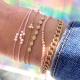 Stacked Pink Gold and Diamond Bracelets