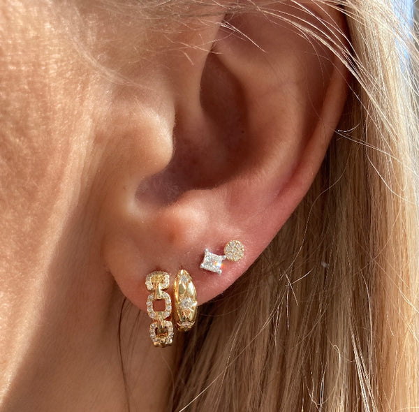 These diamond chain link huggies are paired with the my sun & stars huggies, our very special princess cut diamond studs and the tiniest diamond disc studs.