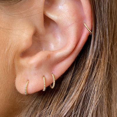 Four Gold Twisted Huggie Hoop Earrings