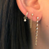 Three Different Bezel Set Diamond Earrings on Ear