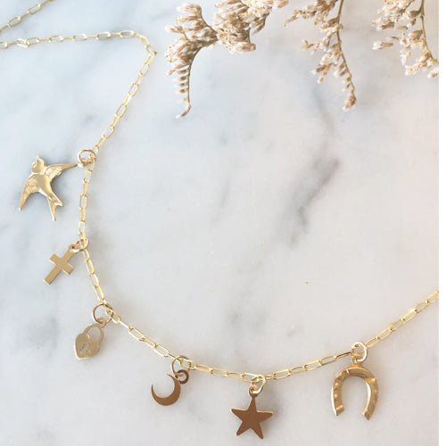 Gold Bird, Cross, Lock, Moon, Star and Horseshoe charms