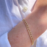 Gold Curb Chain Bracelet with Pave Diamond Links