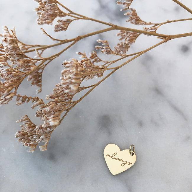 Gold heart charm engraved with always