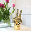 Gold Table Top Peace Sign Hand Sculpture at Katie Diamond in Ridgewood NJ