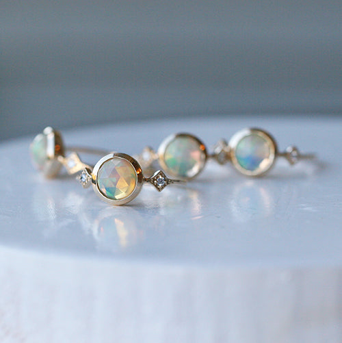 Large Bezel Set Opal Ring with Diamond Side Stones