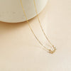 Tiny Moonstone Baguette and Round White Topaz Necklace