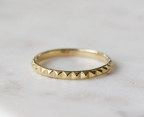 Gold Eternity Band with Studded Pyramid Detail