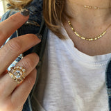 Layered Gold Necklaces and Rings